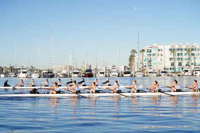 Synchronized rowing team at Mission Bay, ideal for corporate retreats and team-building events.