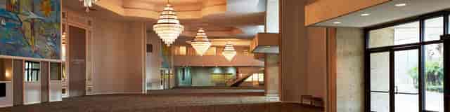 Spacious Town and Country Ballroom with elegant chandeliers for conferences and galas.