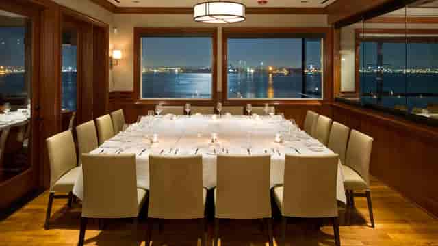 Private dining room with elegant setup for intimate meetings and corporate events.