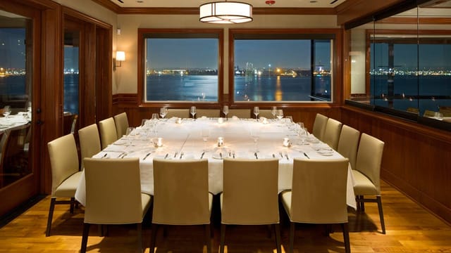 Private dining room with elegant setup for intimate meetings and corporate events.