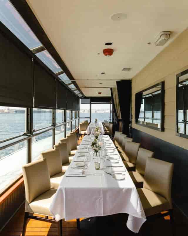 Elegant dining space with waterfront views, ideal for corporate events and private celebrations.