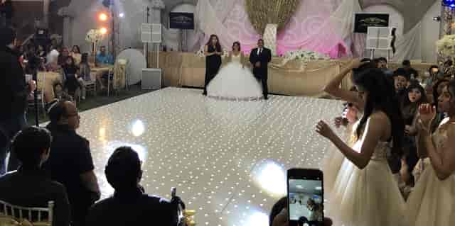 Elegant wedding reception at Babylon Palace with sparkling dance floor and festive ambiance.