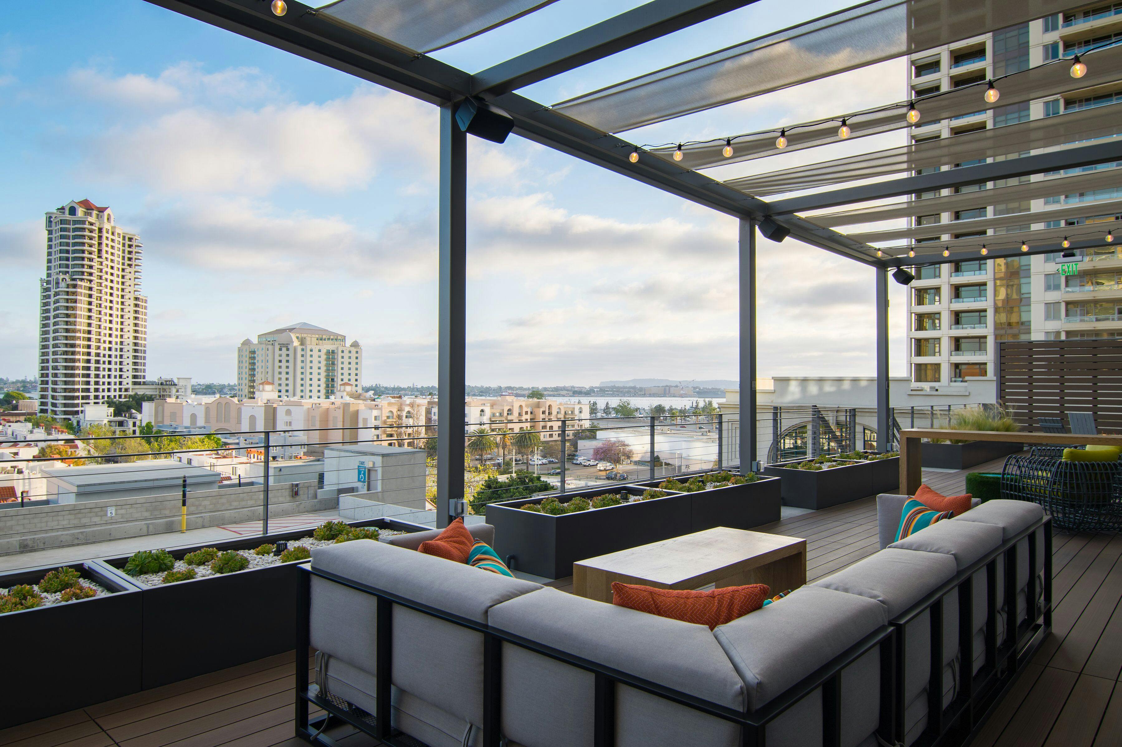 Stylish rooftop patio at Deck655 with city view, perfect for events and gatherings.