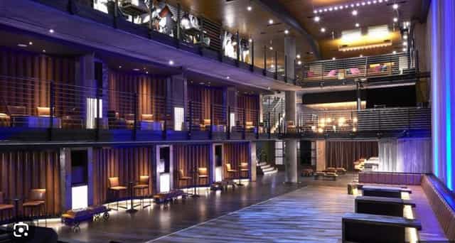 Modern event space with multi-level seating at Music Box San Diego for concerts and networking.