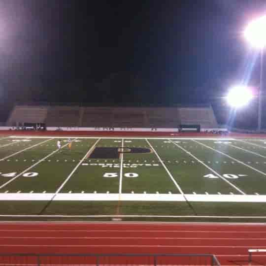 PHS Pirate Stadium sports field, well-lit venue for evening events and gatherings.