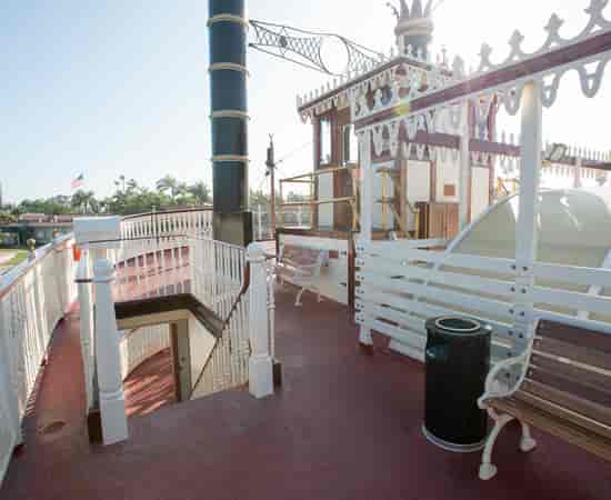 William D. Evans on vintage riverboat deck, perfect for unique events and gatherings.