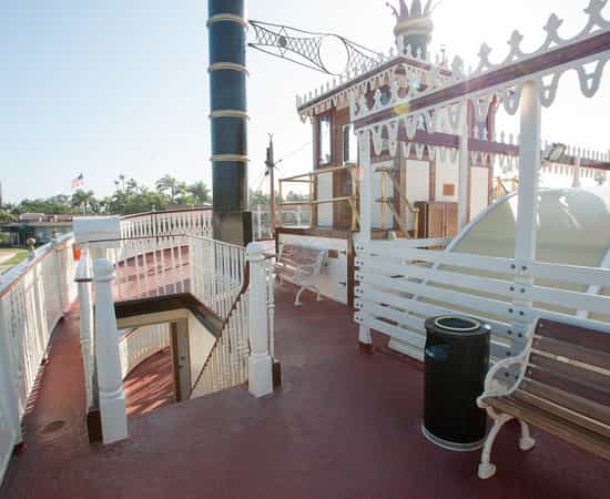 William D. Evans on vintage riverboat deck, perfect for unique events and gatherings.