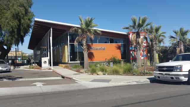 Modern Lincoln Acres Community Venue with large windows, perfect for events and gatherings.