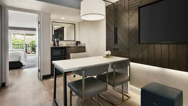 Modern conference room with sleek furniture for productive meetings and events.