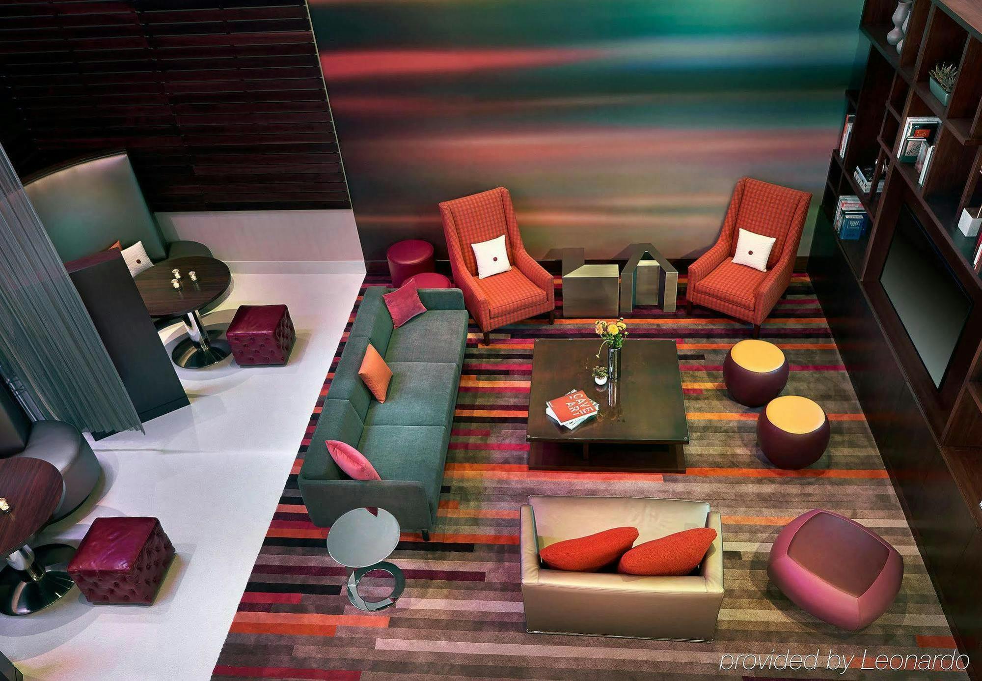 Modern lounge area at The Courtyard Business Center for networking events and meetings.