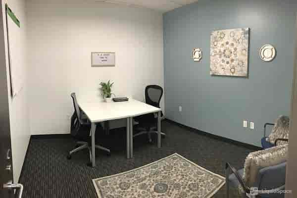 "Intimate meeting room in Landmark Square, Long Beach for team gatherings and consultations."