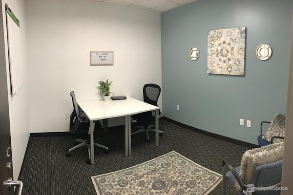 "Intimate meeting room in Landmark Square, Long Beach for team gatherings and consultations."