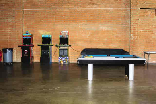 Casual event space with vintage arcade games for networking and team-building in DC.