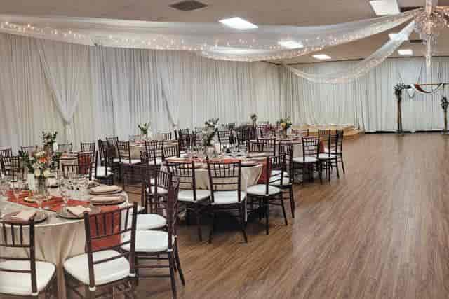Grand Ballroom at La Habra Community Center, elegant wedding venue with floral centerpieces.