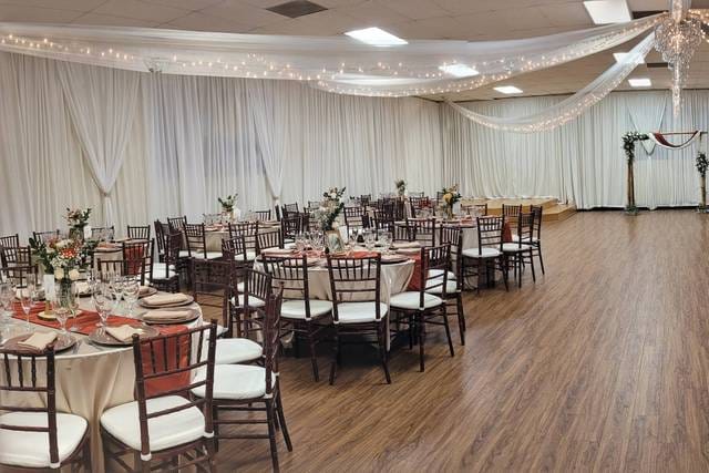 Grand Ballroom at La Habra Community Center, elegant wedding venue with floral centerpieces.