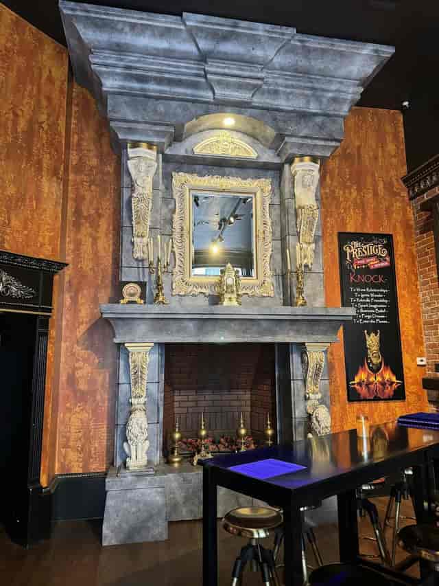 Ornate fireplace in MyWorld Solutions showroom, perfect for networking events and gatherings.