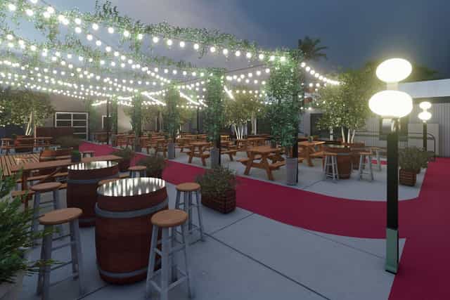 Outdoor patio with string lights at The Wine Pub, perfect for events and gatherings.