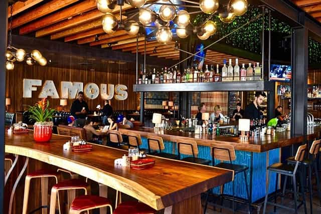 Main Dining Area at Jimmy's Famous American Tavern, vibrant bar for networking events.