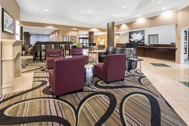 Lounge at La Quinta Inn, modern decor, ideal for networking and casual meetings.