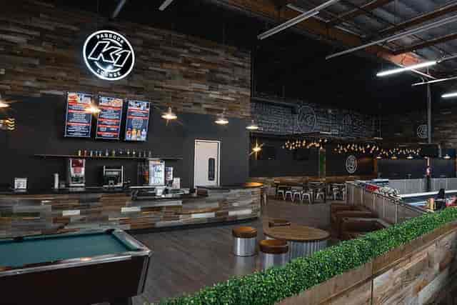 Modern Paddock Lounge with rustic wood accents, ideal for events and gatherings.