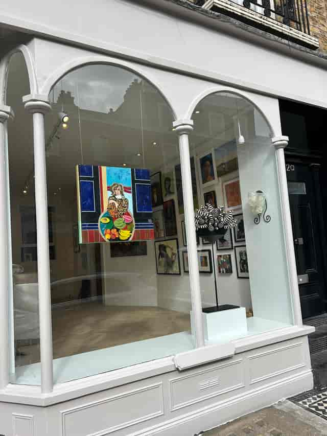 Vibrant art gallery space with colorful artwork, ideal for events and exhibitions.