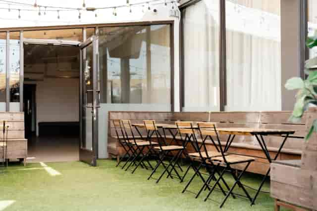 Versatile outdoor event space at Snake Oil Cocktail Co. for meetings and gatherings.