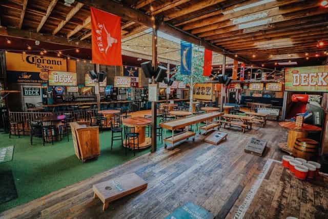 Mezzanine Table at Moonshine Flats: vibrant event space for social gatherings and team-building.