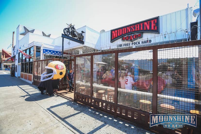 Mezzanine Table at Moonshine Flats, vibrant outdoor venue for watch parties and celebrations.