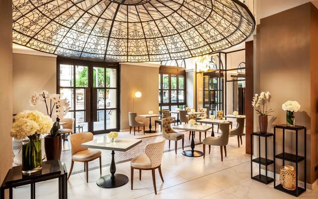 Zsolnay II event space with glass ceiling, ideal for upscale gatherings and meetings.