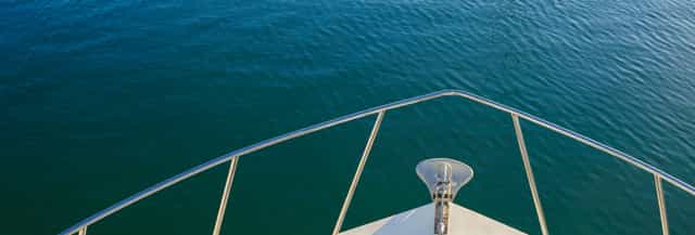 Main Enclosed Deck on Legacy Cruises, serene boat view for outdoor events and retreats.