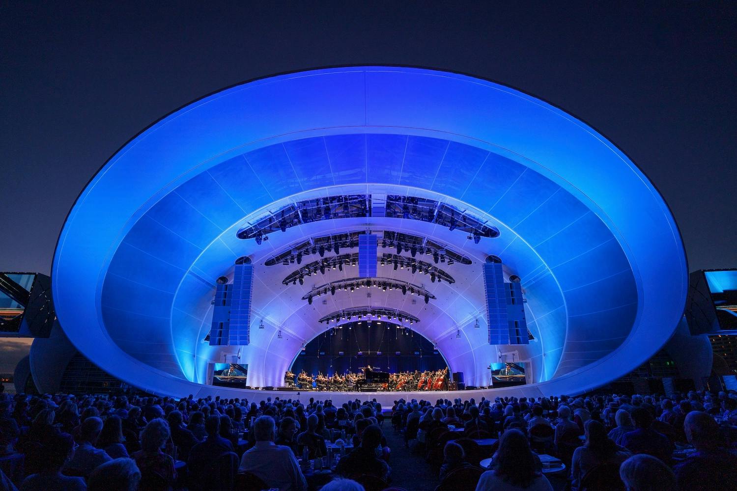 Main stage at San Diego Creative Events, illuminated amphitheater for concerts and performances.