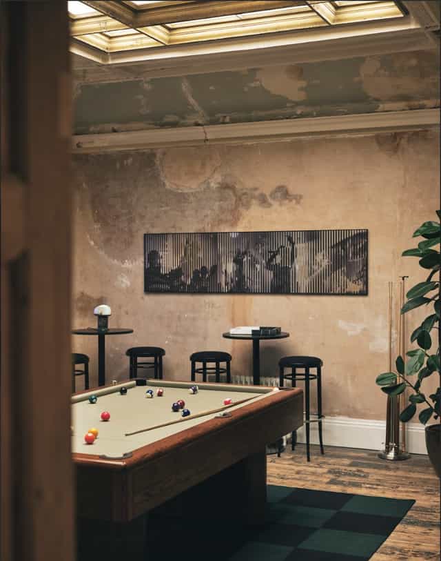 Billiards room with pool table at Knotel Workclub, perfect for networking and brainstorming.