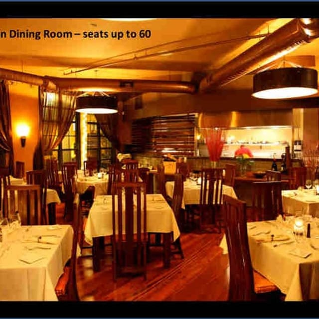 Elegant restaurant setting with soft lighting for intimate gatherings and corporate events.