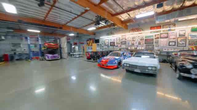 Vintage car-themed event space in Suite 101, ideal for corporate gatherings and networking.