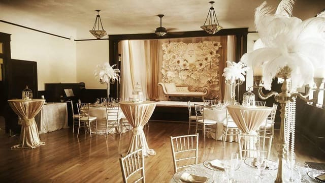 Elegant San Jose Clubhouse ballroom with gold decor, ideal for weddings and corporate events.