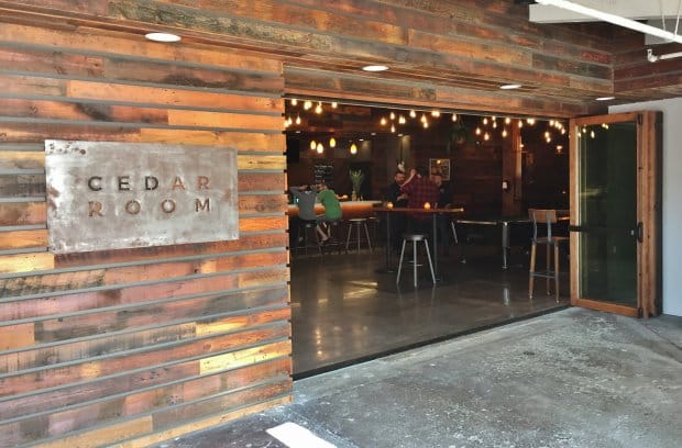 Cedar Room event space with rustic design, ideal for meetings and gatherings.