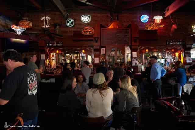 Vibrant Khartoum Lounge bar with warm lighting, ideal for networking events and social gatherings.
