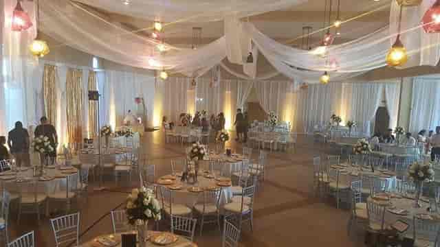 Elegant Bar Lounge setup with floral centerpieces for weddings and formal events.