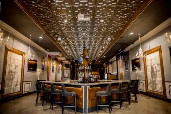 Elegant Bistro event space in Palo Alto with sophisticated bar and chandeliers.