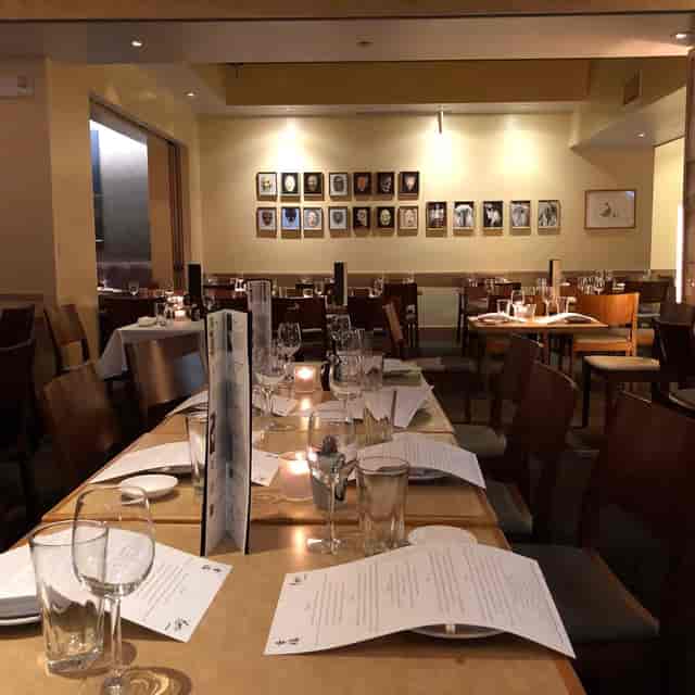Semi-private dining area at Yoshi's, ideal for intimate gatherings and corporate events.