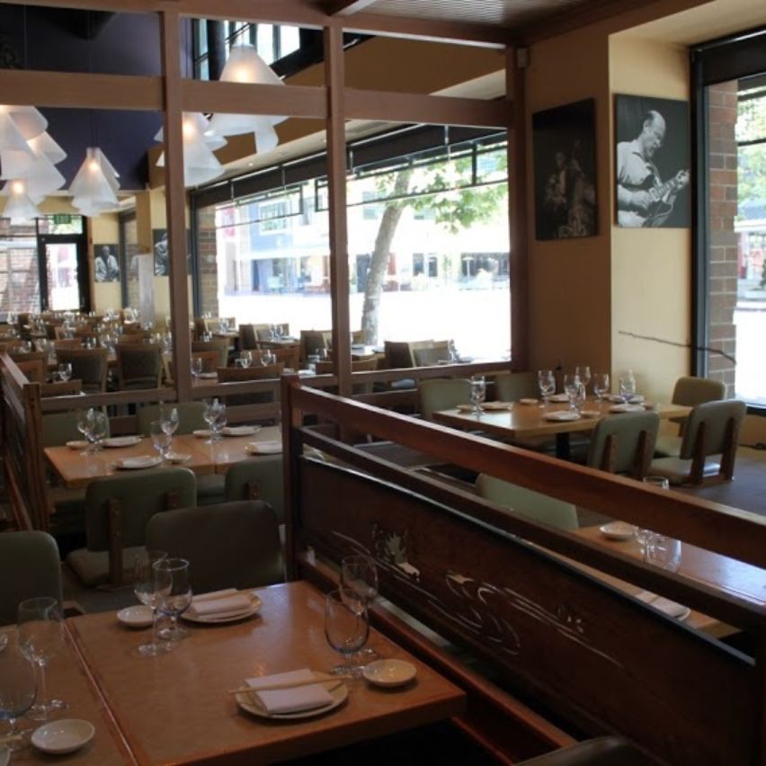 Semi-private dining area at Yoshi's, perfect for corporate events and private gatherings.