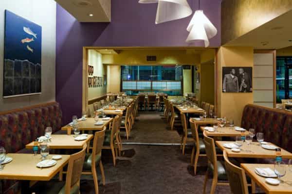 Main Dining Room at Yoshi's, modern decor, ideal for events and gatherings.