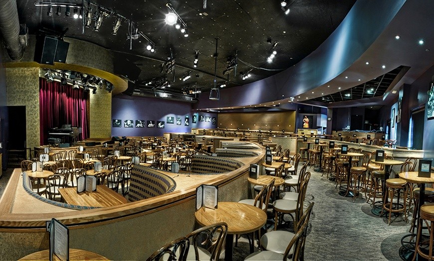 Main Dining Room at Yoshi's with tiered seating for corporate events and live entertainment.