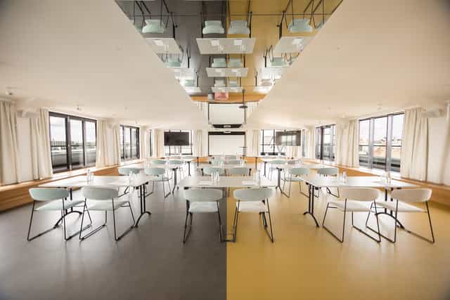 Conference room with flexible seating and natural light at Wellton Riverside Spa Hotel.