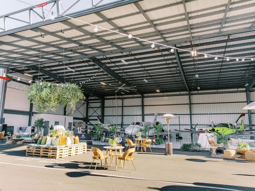 Fire pit in Hangar 858, modern decor for corporate events and private gatherings.