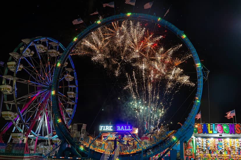Vibrant carnival at Santa Clara County Fairgrounds with fireworks, ideal for outdoor events.