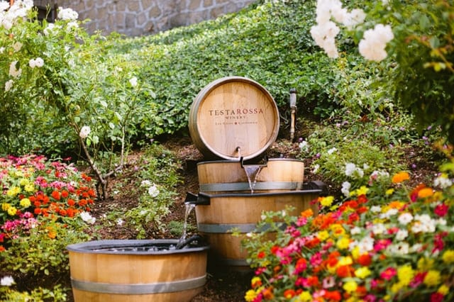 Testarossa Winery Grand Patio with wine barrels, perfect for elegant garden events.