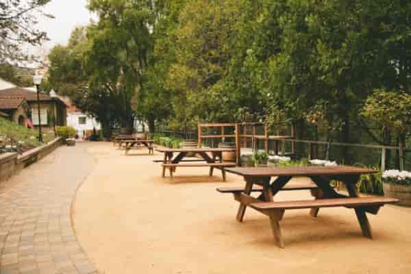 Testarossa Winery Grand Patio with picnic tables, perfect for outdoor events and gatherings.