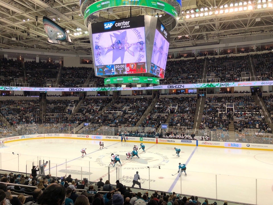 Vibrant arena with fans at PETE BE CENTER for a live sporting event.