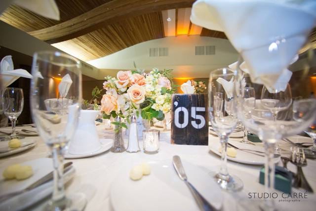 Elegant dining table with pastel flowers for weddings and corporate events.